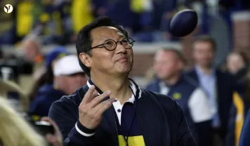 Michigan President Ono Unexpectedly Heads to Florida