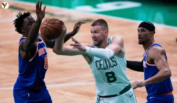 Porziņģis' Illness Sinks Celtics in Playoff Opener