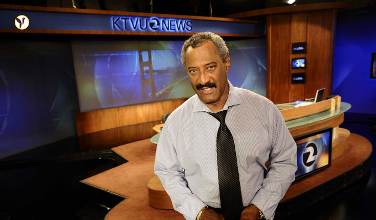 Legendary KTVU news anchor Dennis Richmond in a newsroom setting
