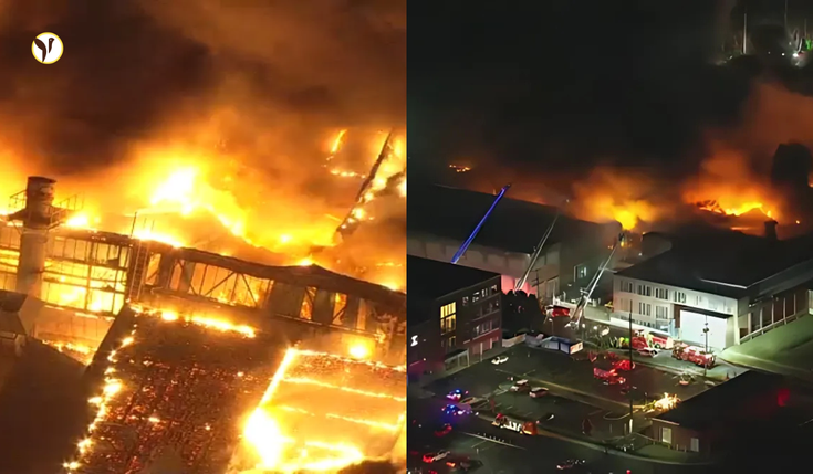Firefighters battling massive fire at SPS Technologies warehouse in Abington Township, PA.