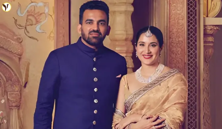 Zaheer Khan holding baby Fatehsinh Khan with Sagarika smiling