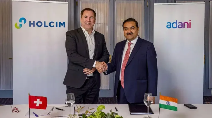 Adani acquire stakes in ambuja acc